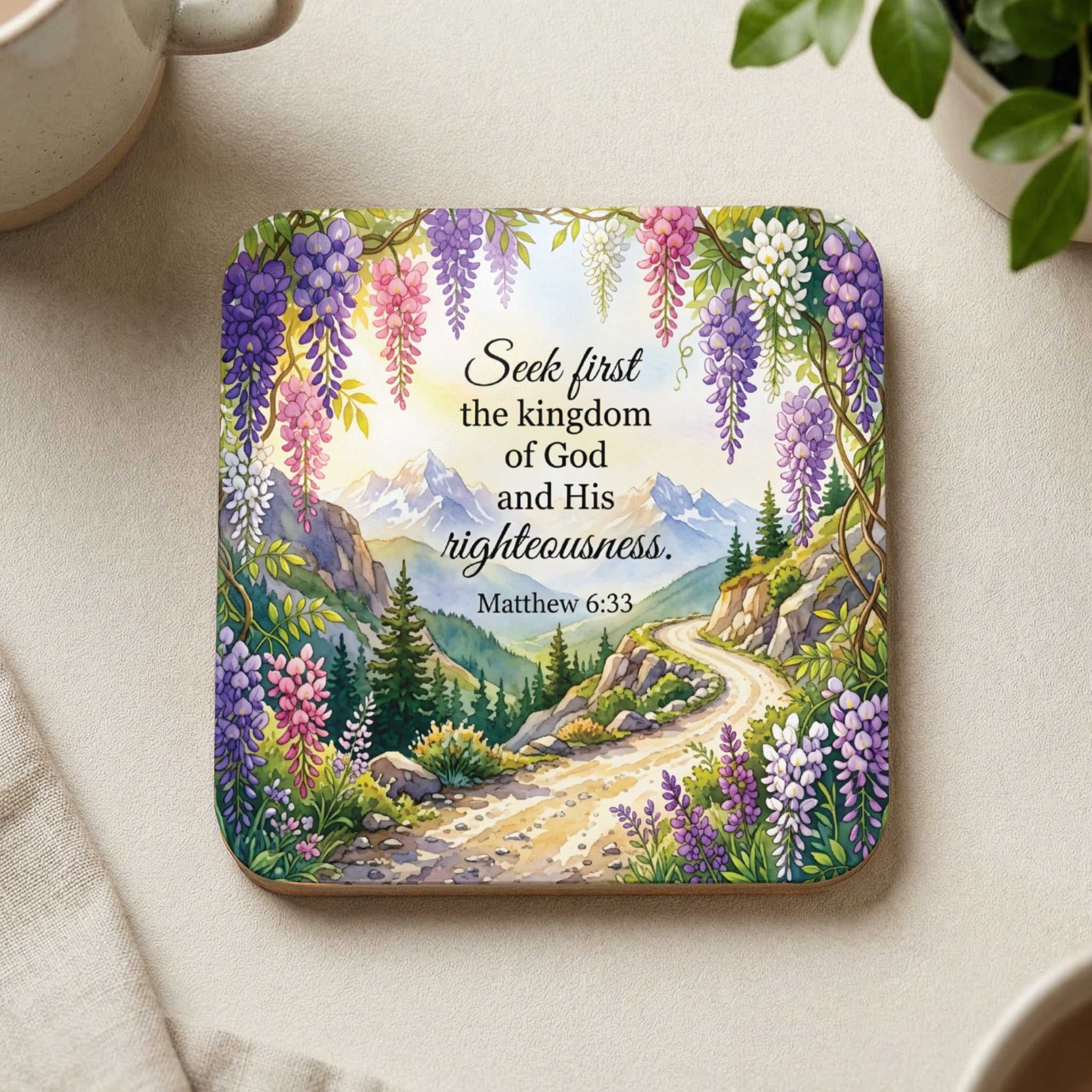 Square coaster with wisteria, mountains, and Matthew 6:33 Bible verse.