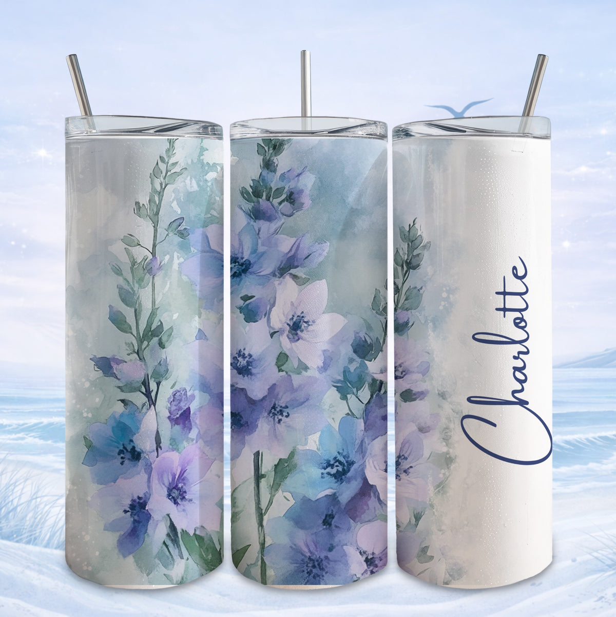 Three tumblers with blue floral watercolor design and "Charlotte" text.