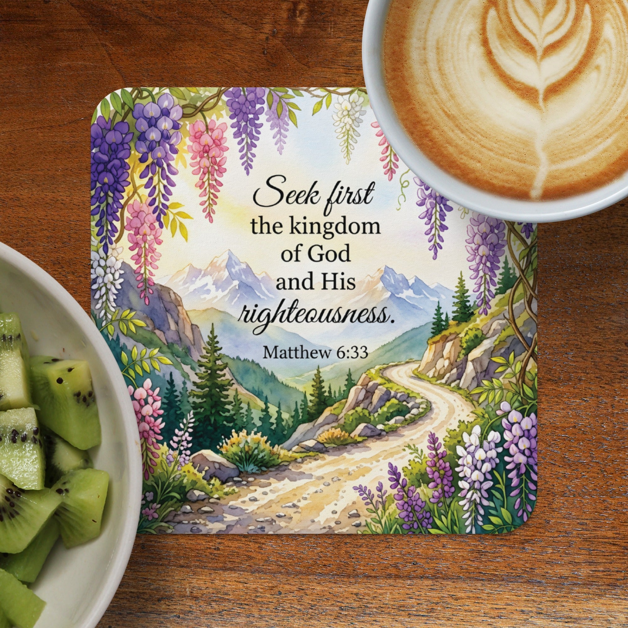 Coaster with Matthew 6:33 scripture and floral mountain landscape.