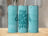 Turquoise tumbler with "Me, My Dog, and Cat Talk About You" text.