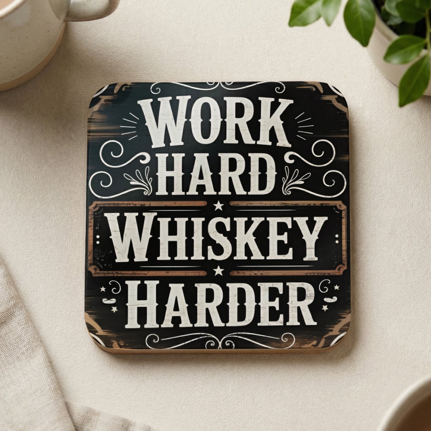 Coaster with "Work Hard Whiskey Harder" text on distressed wood background.