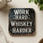 Coaster with "Work Hard Whiskey Harder" text on distressed wood background.