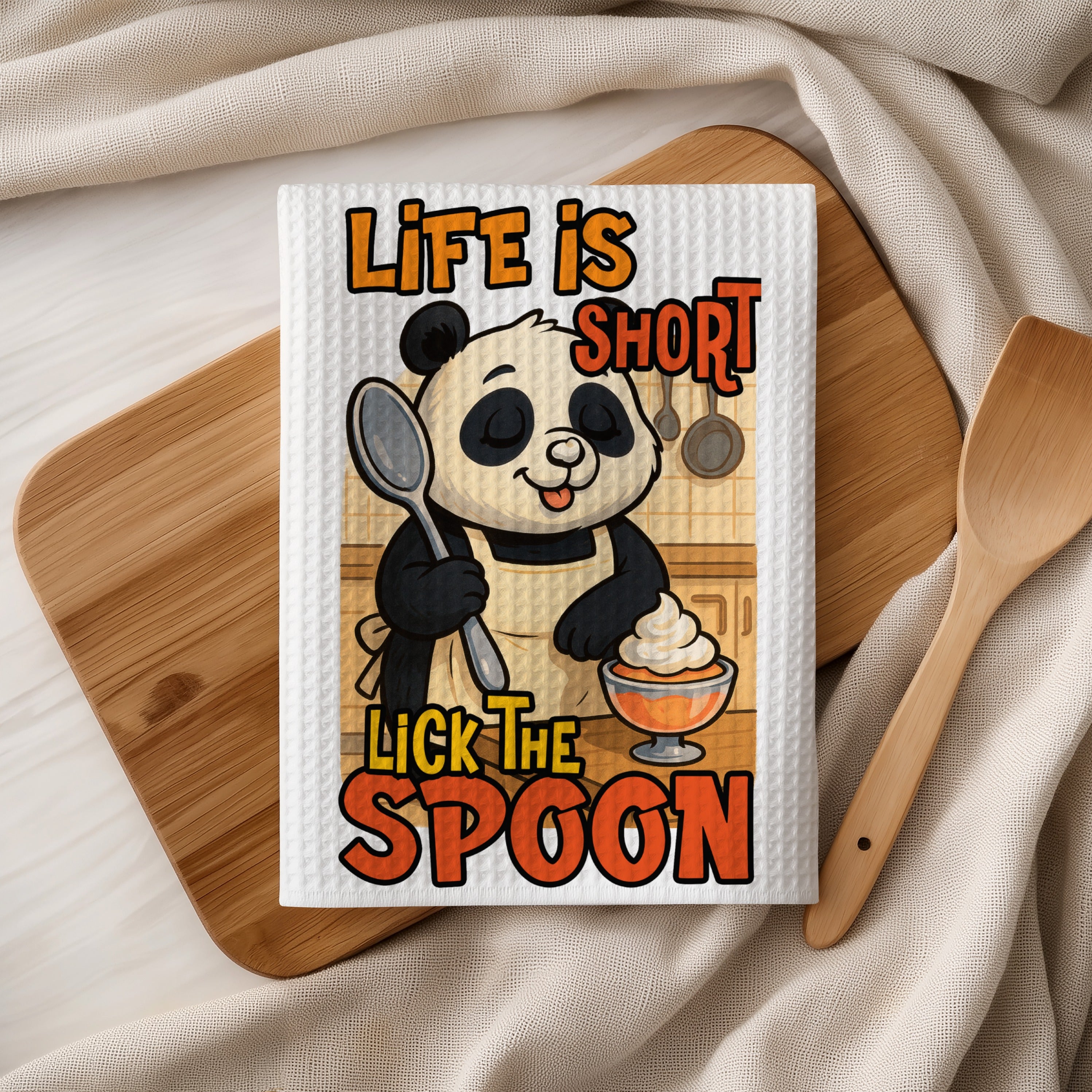 Panda wearing apron holding spoon, text "LIFE IS SHORT LICK THE SPOON".