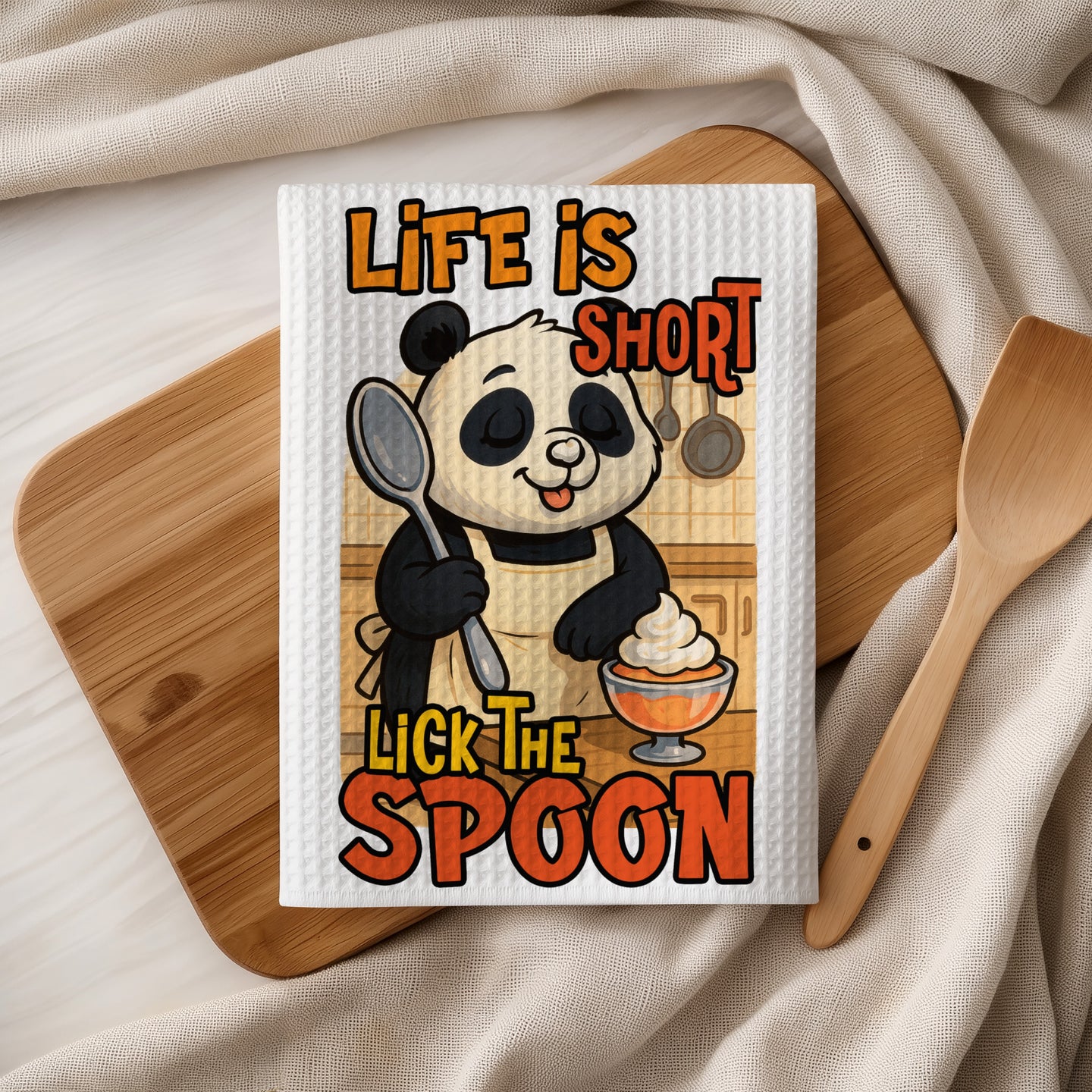 Panda wearing apron holding spoon, text "LIFE IS SHORT LICK THE SPOON".