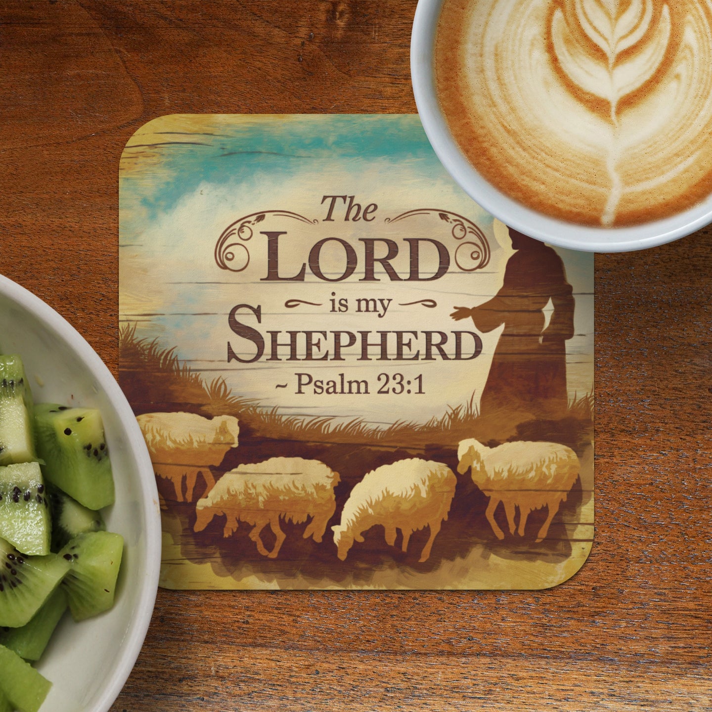 Coaster with sheep, shepherd silhouette, and "The Lord is my shepherd Psalm 23:1".