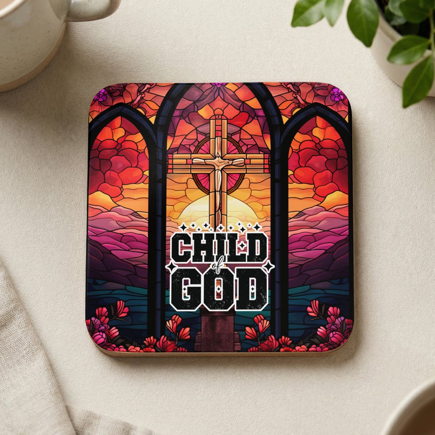Square coaster with stained glass cross and "Child of God" text.