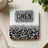 Coaster with "AMEN" and "TRUST IN THE LORD" text, leopard print and glitter design.