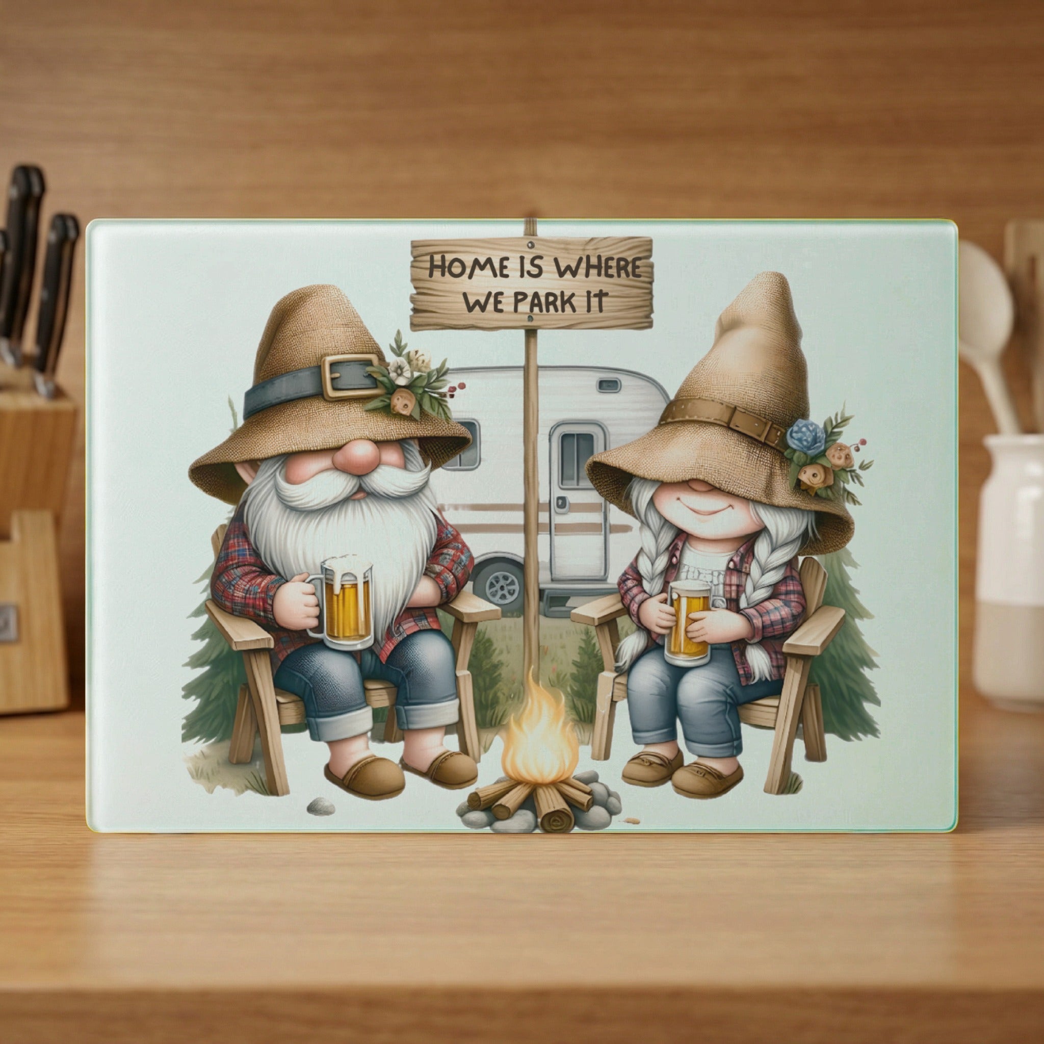 Two gnomes sit by a campfire, mugs of beer in hand, with a camper in the background.