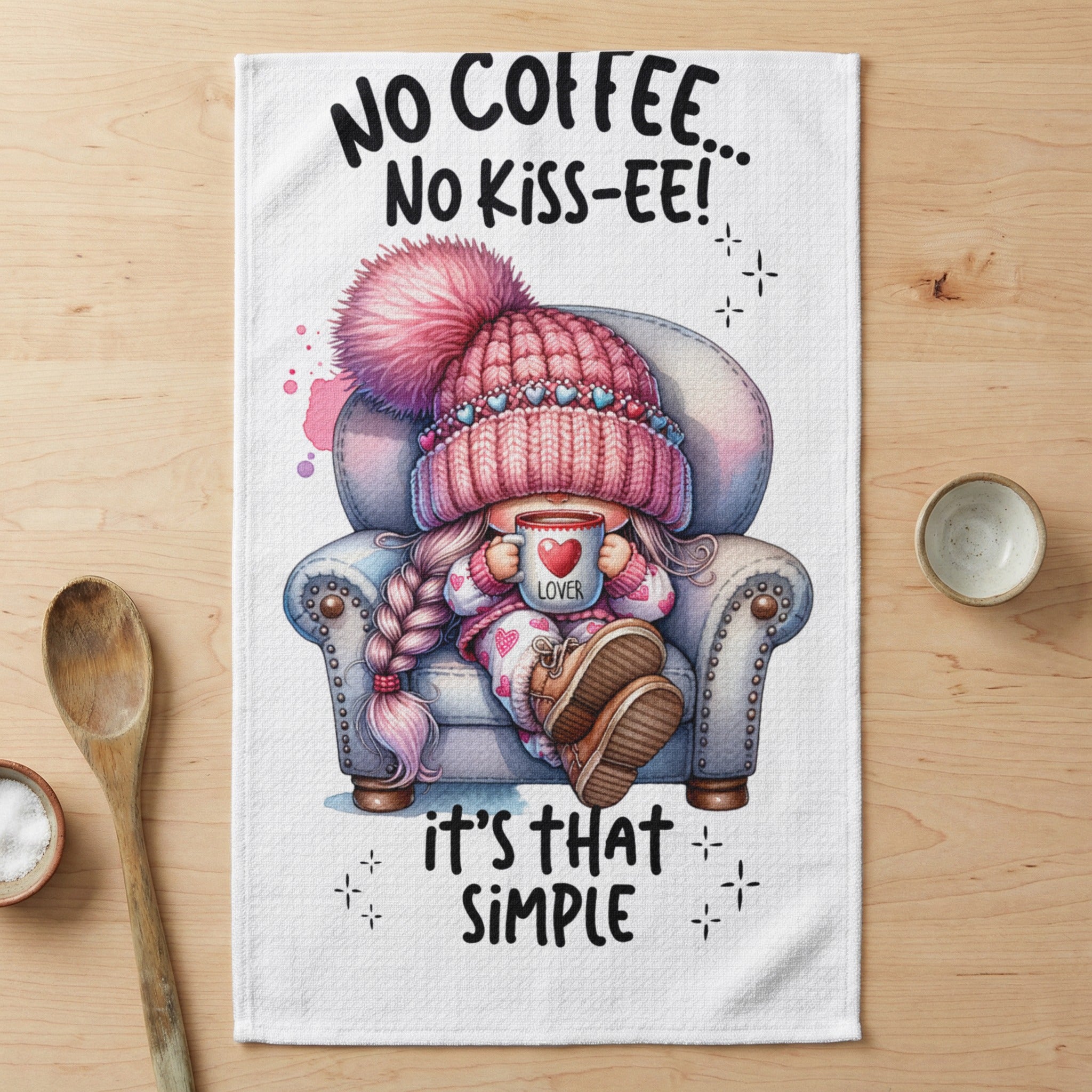 Towel with "No coffee, no kiss-ee! It's that simple" text and illustration.