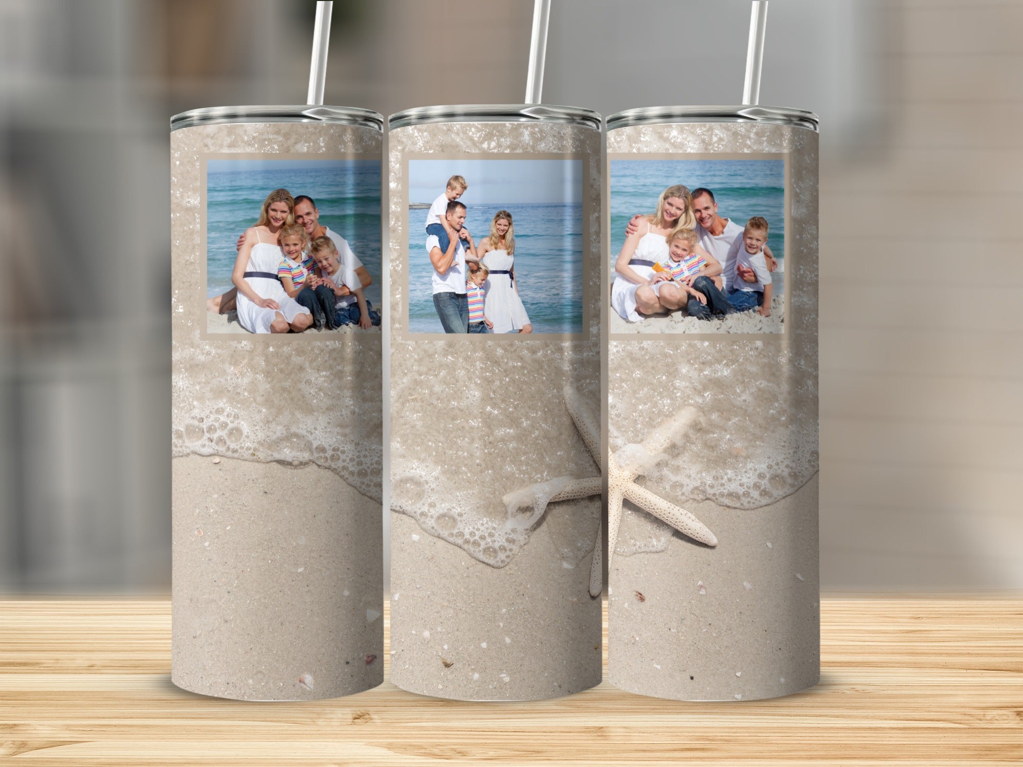 Three tumblers featuring a family on a beach with a starfish.