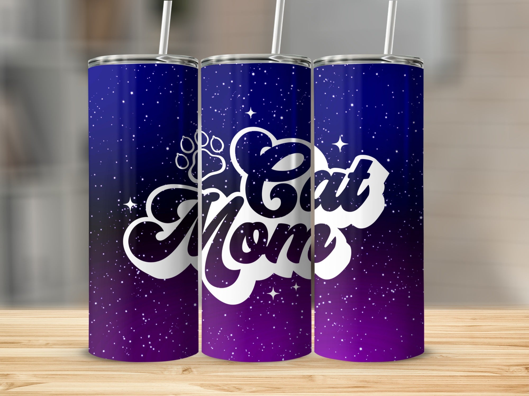 Purple and blue gradient tumbler with "Cat Mom" text and stars.
