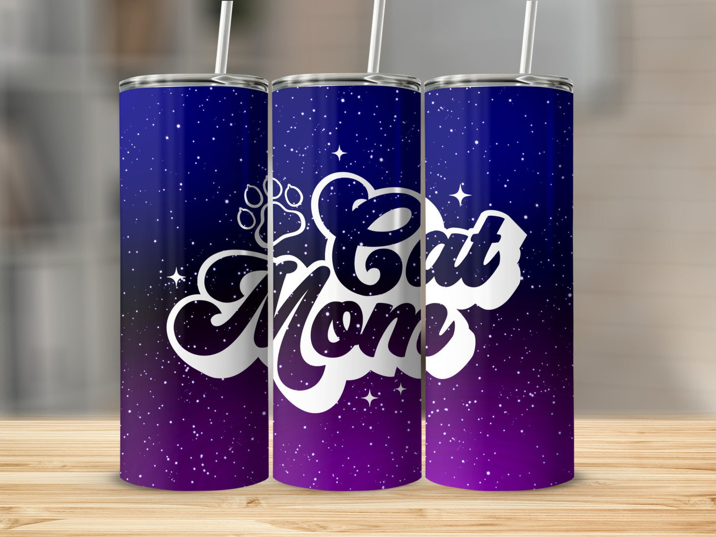 Purple and blue gradient tumbler with "Cat Mom" text and stars.