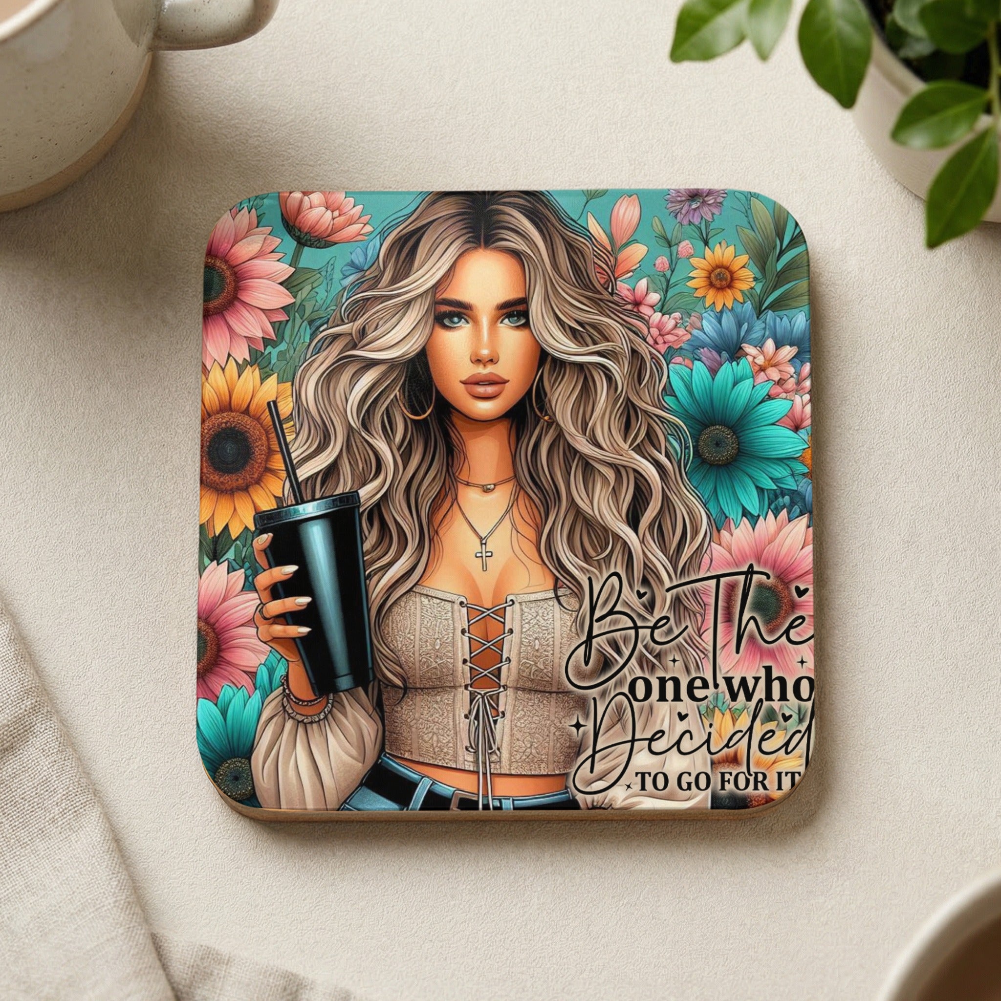 Woman in white corset holding black cup with floral background and text "Be the one who decided to go for it".