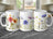 Three mugs with watercolor wildflowers in red, orange, blue, and purple.