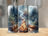 Three tumblers featuring a campfire, forest, and starry night scene.