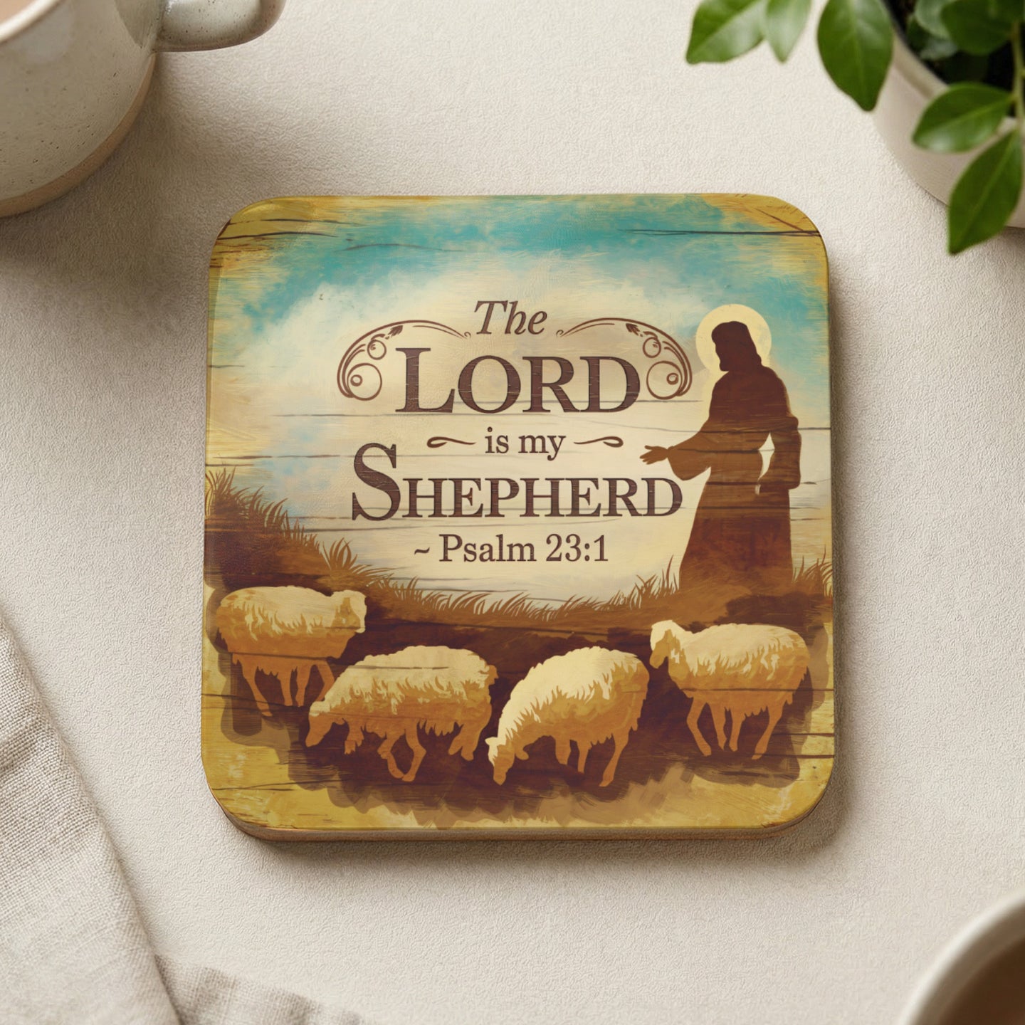 Wooden coaster with "The Lord is my Shepherd ~ Psalm 23:1" and Jesus silhouette guiding sheep.