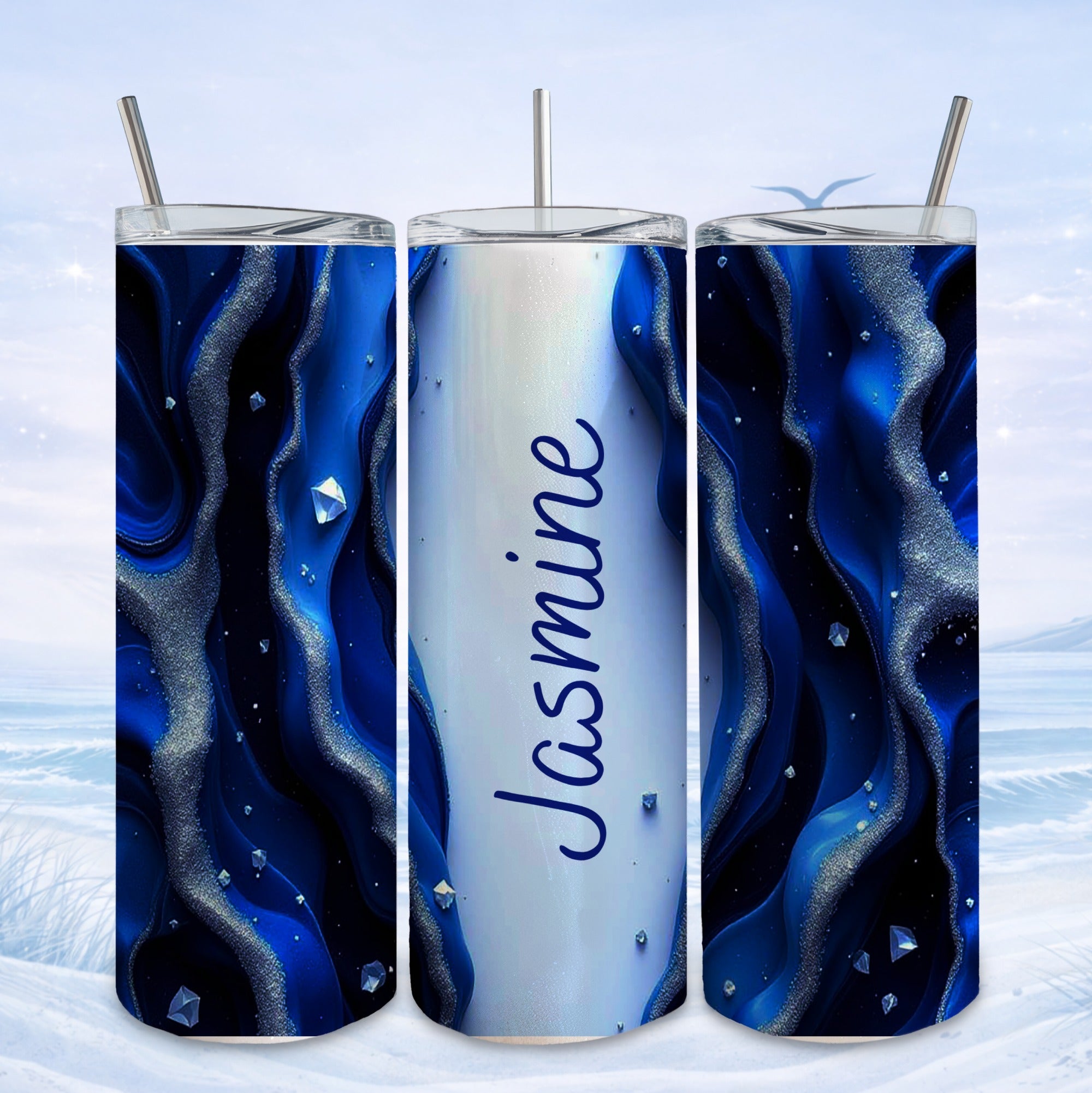 Three tumblers with a swirling blue and white marble design and the name "Jasmine."