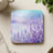 Watercolor lavender field with soft sky and a cup.