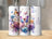 Three tumblers with butterflies and floral designs, one says "Olivia".