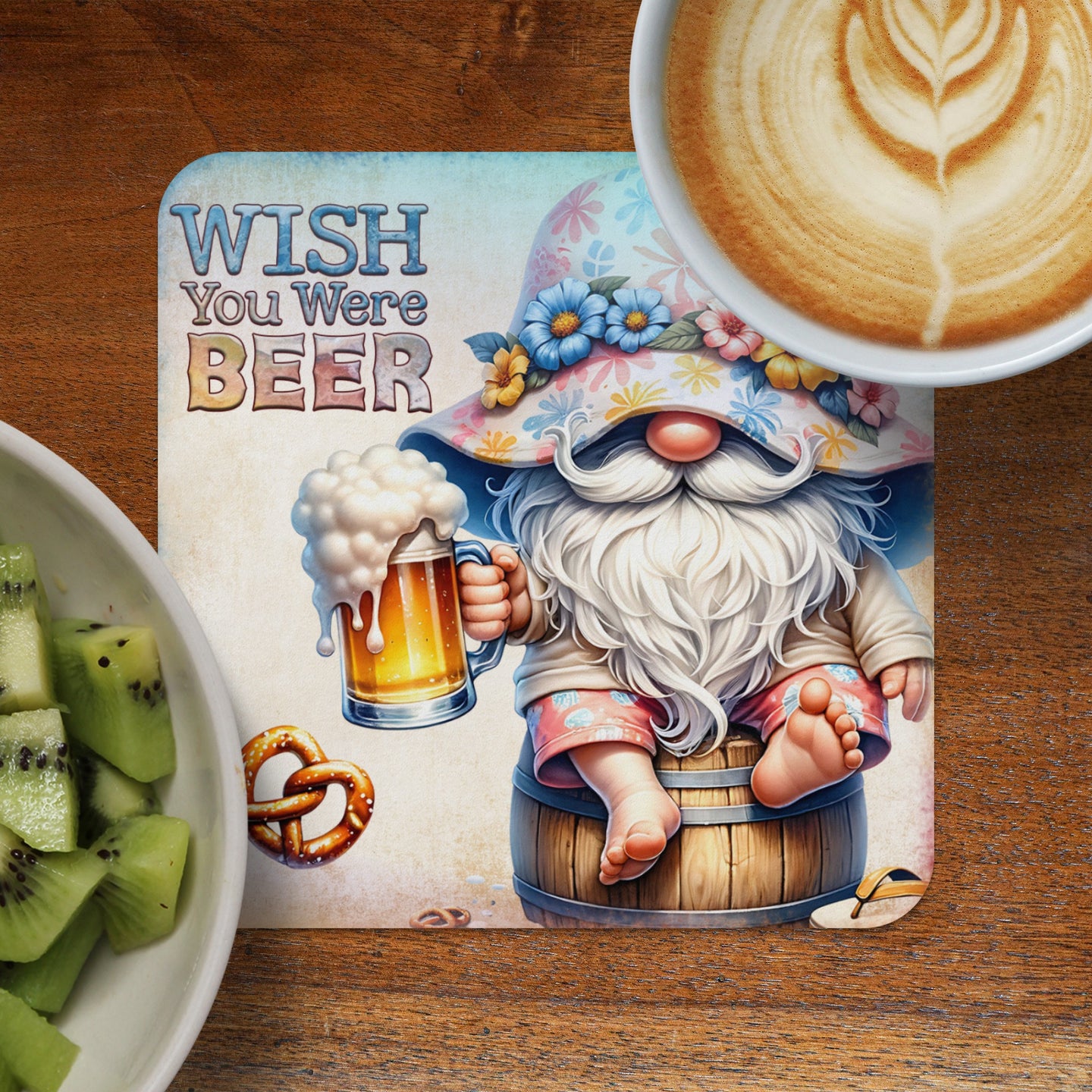 Gnome in a hat holding a beer mug, sitting on a barrel.