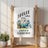 White towel with "Nature called, I went camping" and a camper illustration.