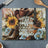 Cowboy boots, hat, and guitar with sunflowers and text "Fueled by coffee and country music".