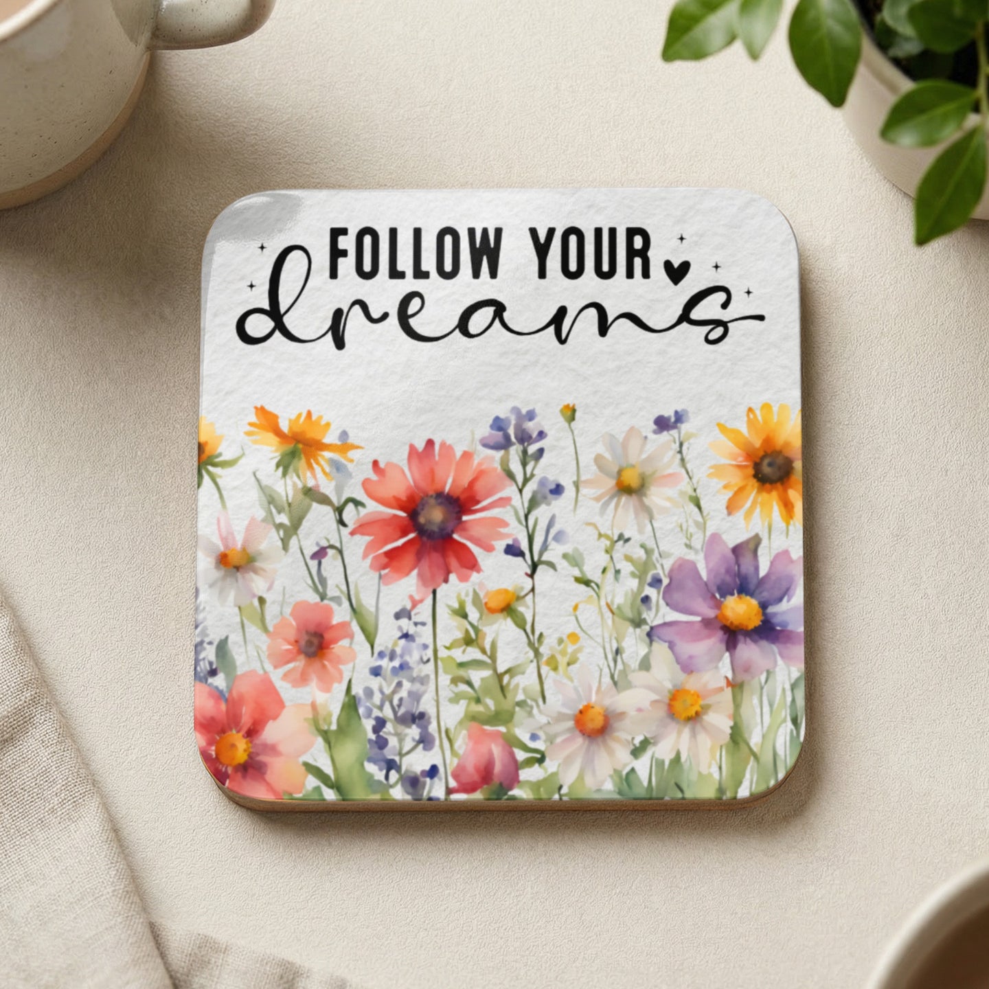 Coaster with watercolor wildflowers and text "FOLLOW YOUR dreams".