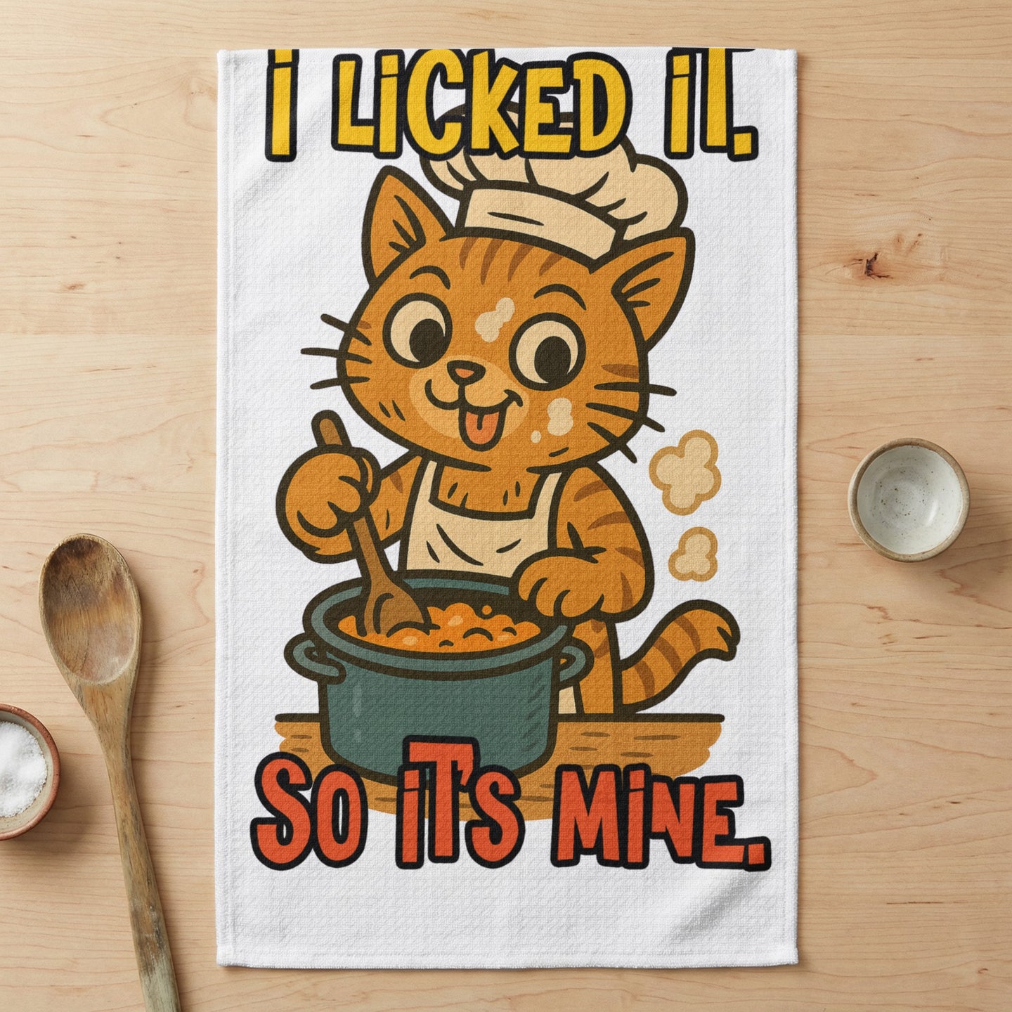 Cartoon cat chef stirring pot with text "I licked it. So it's mine."