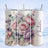 Floral tumbler with "Charlotte" text, featuring pink roses and purple flowers.