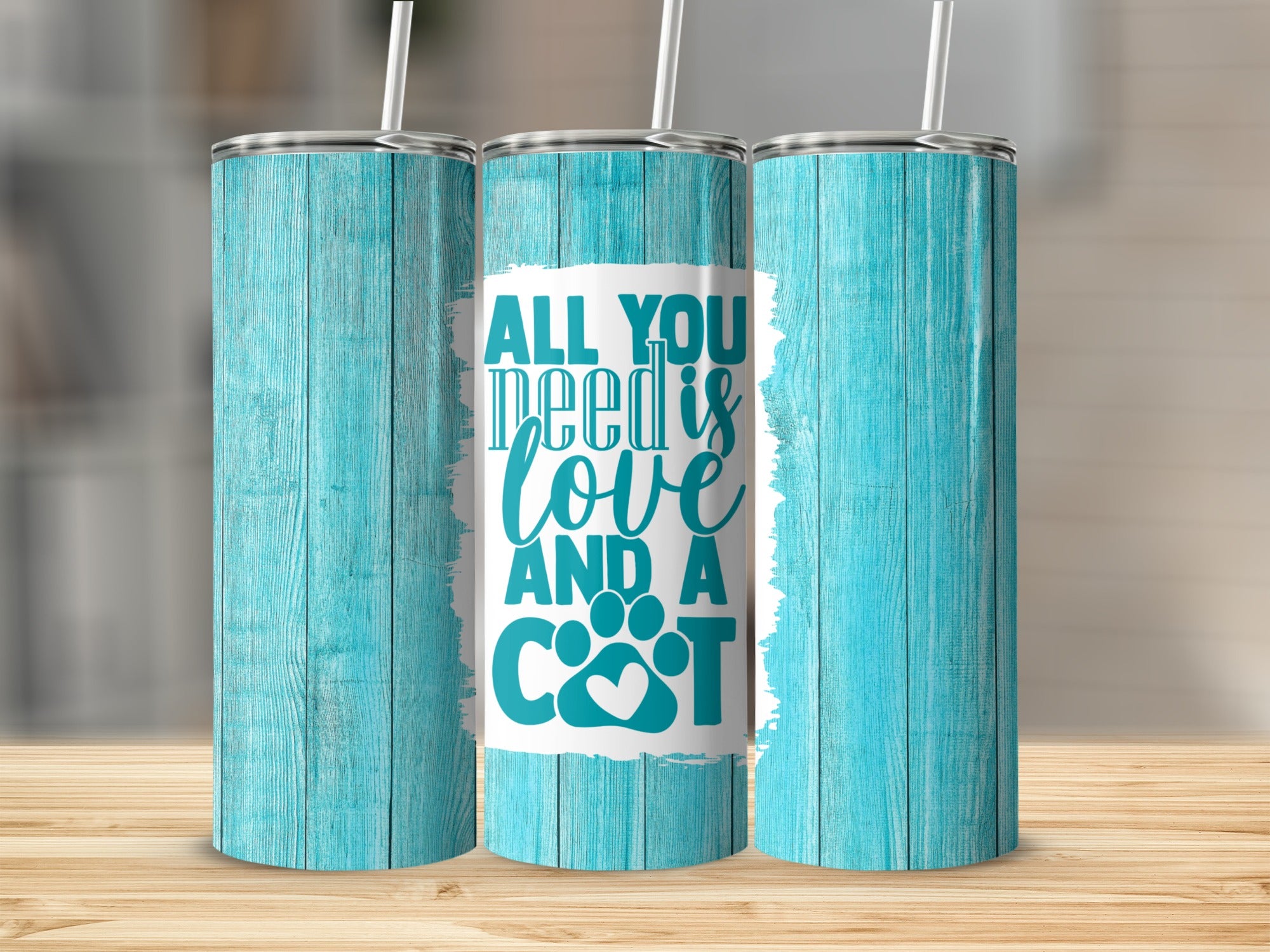 Three tumblers with blue wood grain texture and "All you need is love and a cat" text.