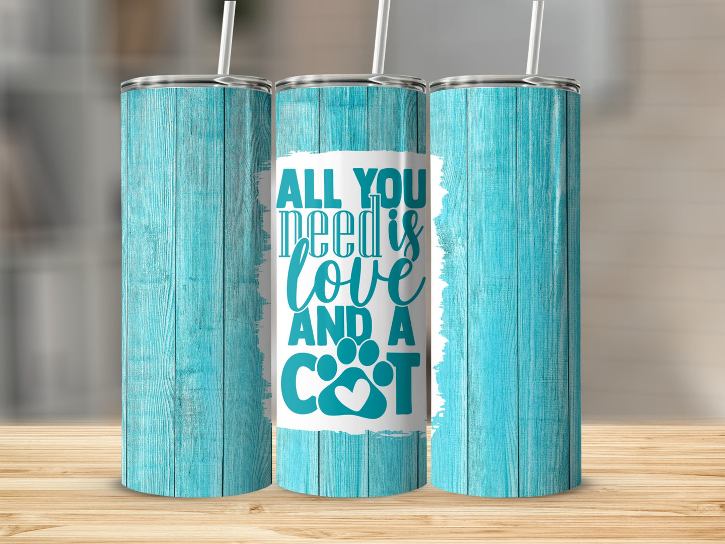 Three tumblers with blue wood grain texture and "All you need is love and a cat" text.