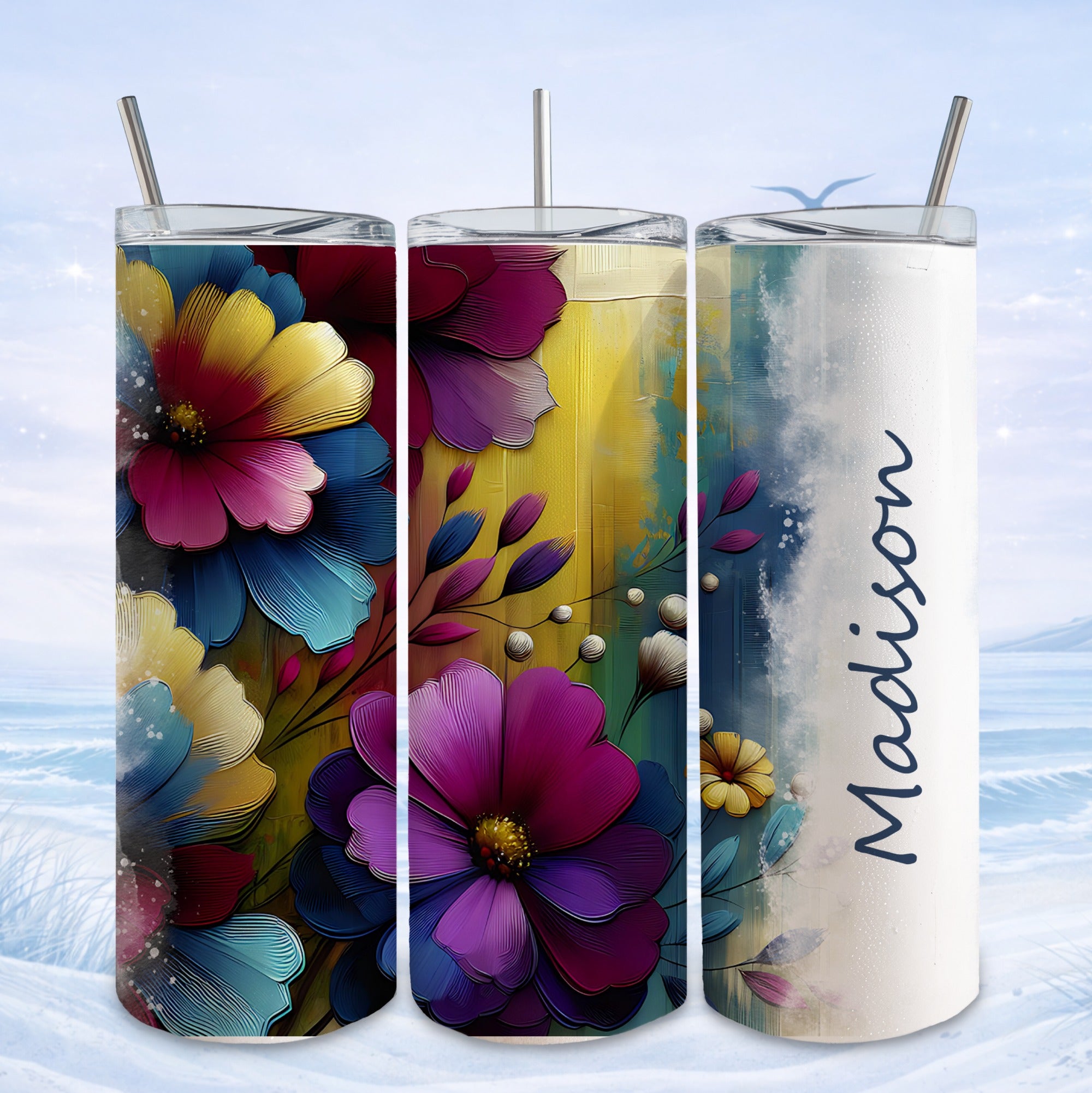 Three tumblers with floral designs, one customized with "Madison".