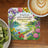 Coaster with a scenic landscape, lake, flowers, and the Bible verse Ephesians 4:32.