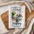 Kitchen towel with a watercolor illustration of a sink and the text "A messy kitchen is a happy kitchen."