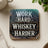 Coaster with "WORK HARD WHISKEY HARDER" text on wood grain background.