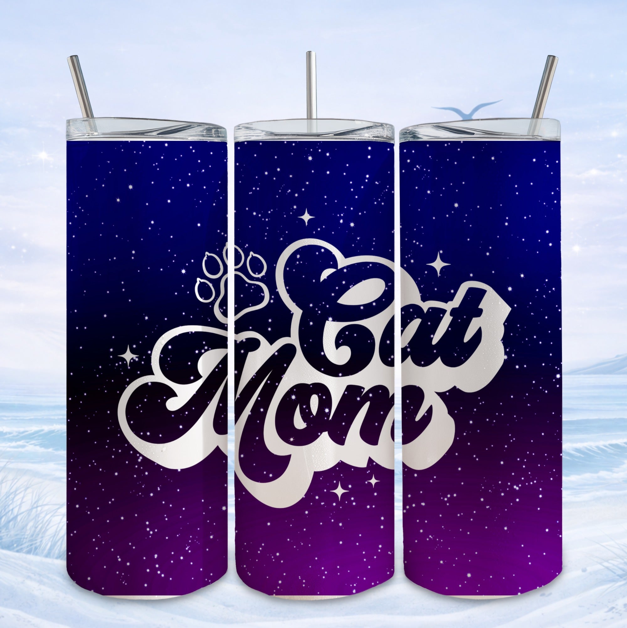 Tumbler with "Cat Mom" text and paw print on starry purple background.