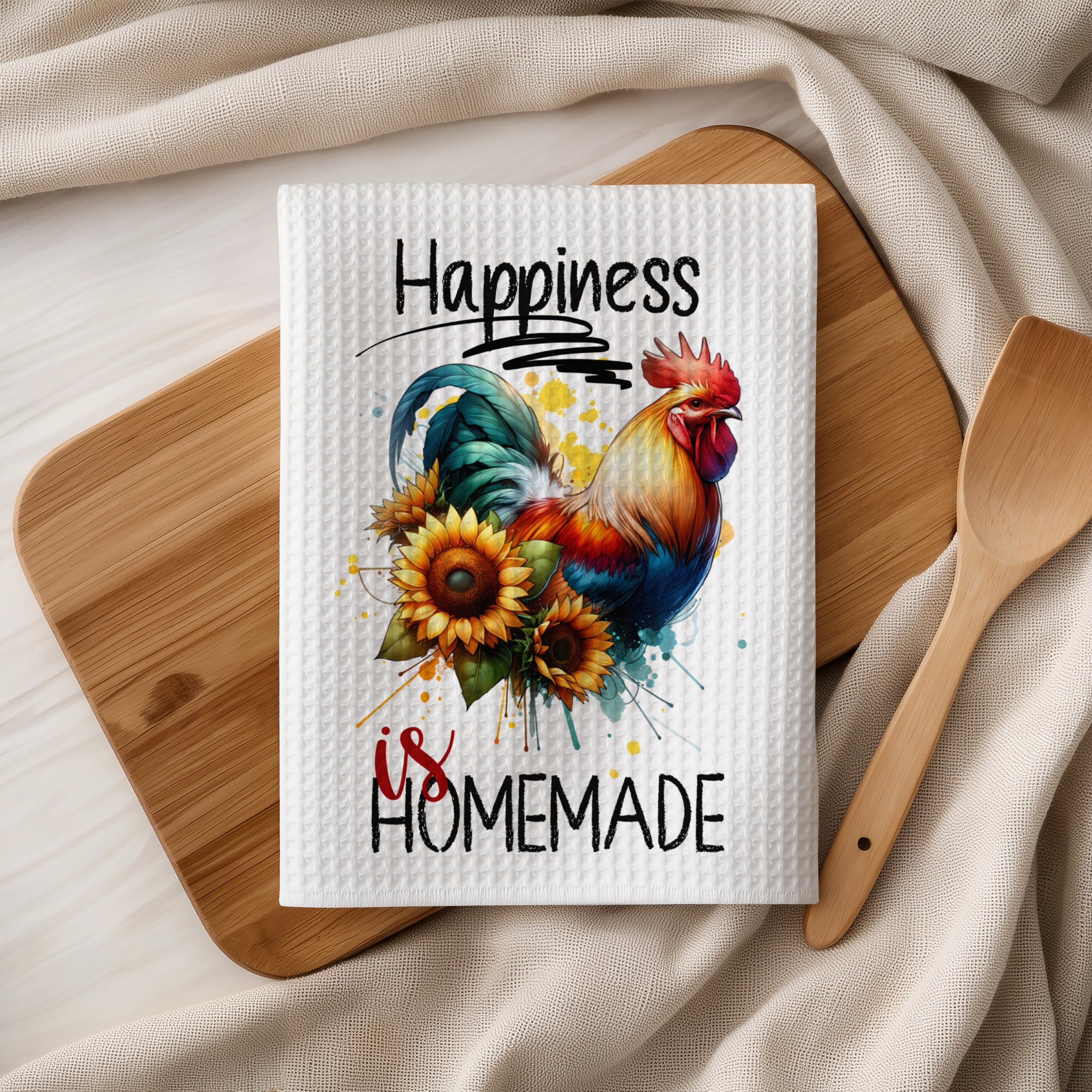 Rooster and sunflowers on a tea towel that says "Happiness is HOMEMADE".