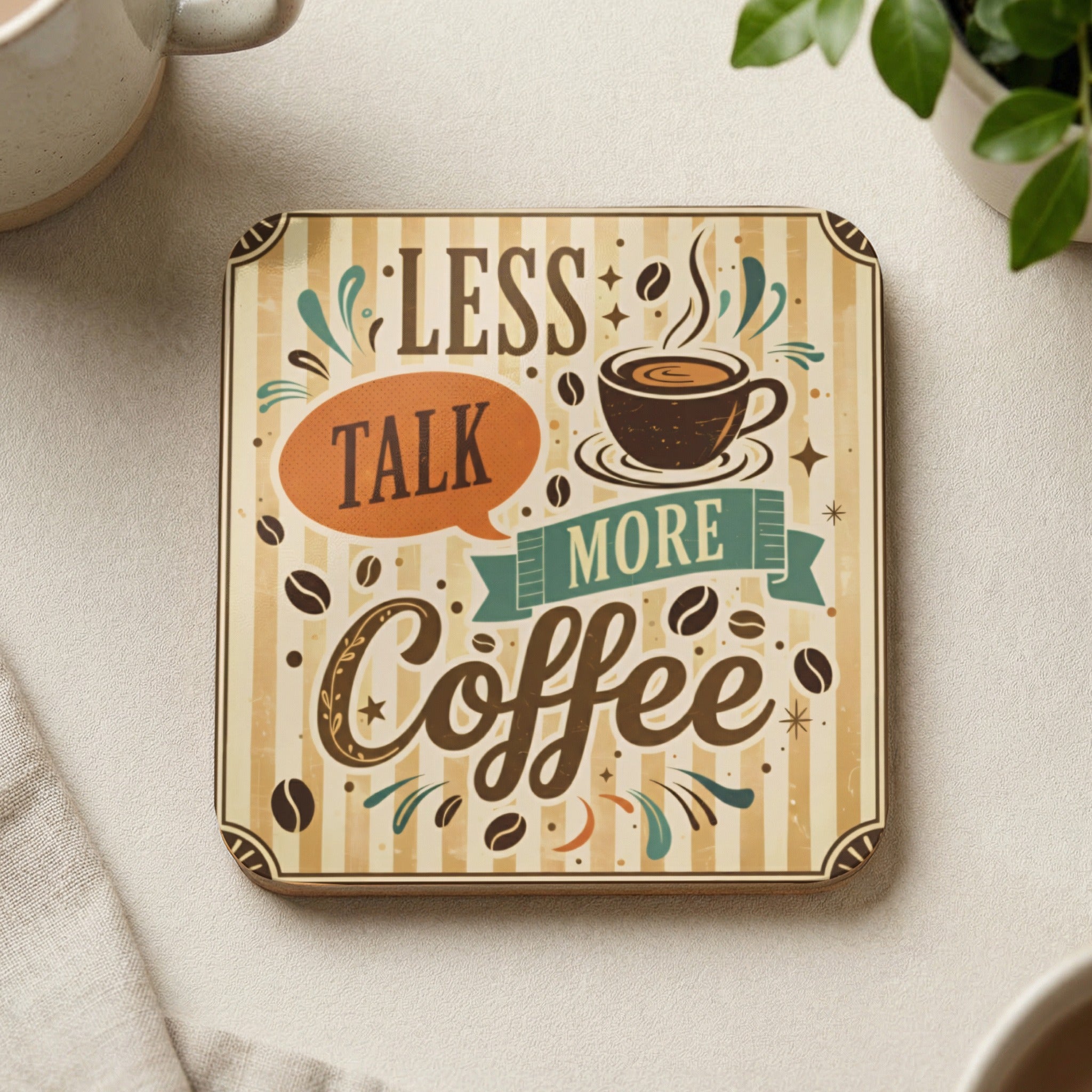 Square coaster with "Less Talk, More Coffee" text and coffee cup illustration.