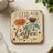 Square coaster with "Less Talk, More Coffee" text and coffee cup illustration.