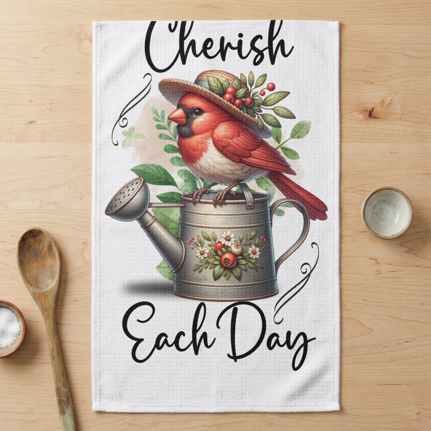 Cardinal on watering can with "Cherish Each Day" text.