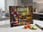 Cutting board with American flag, patriotic decor, pie, and vegetables.