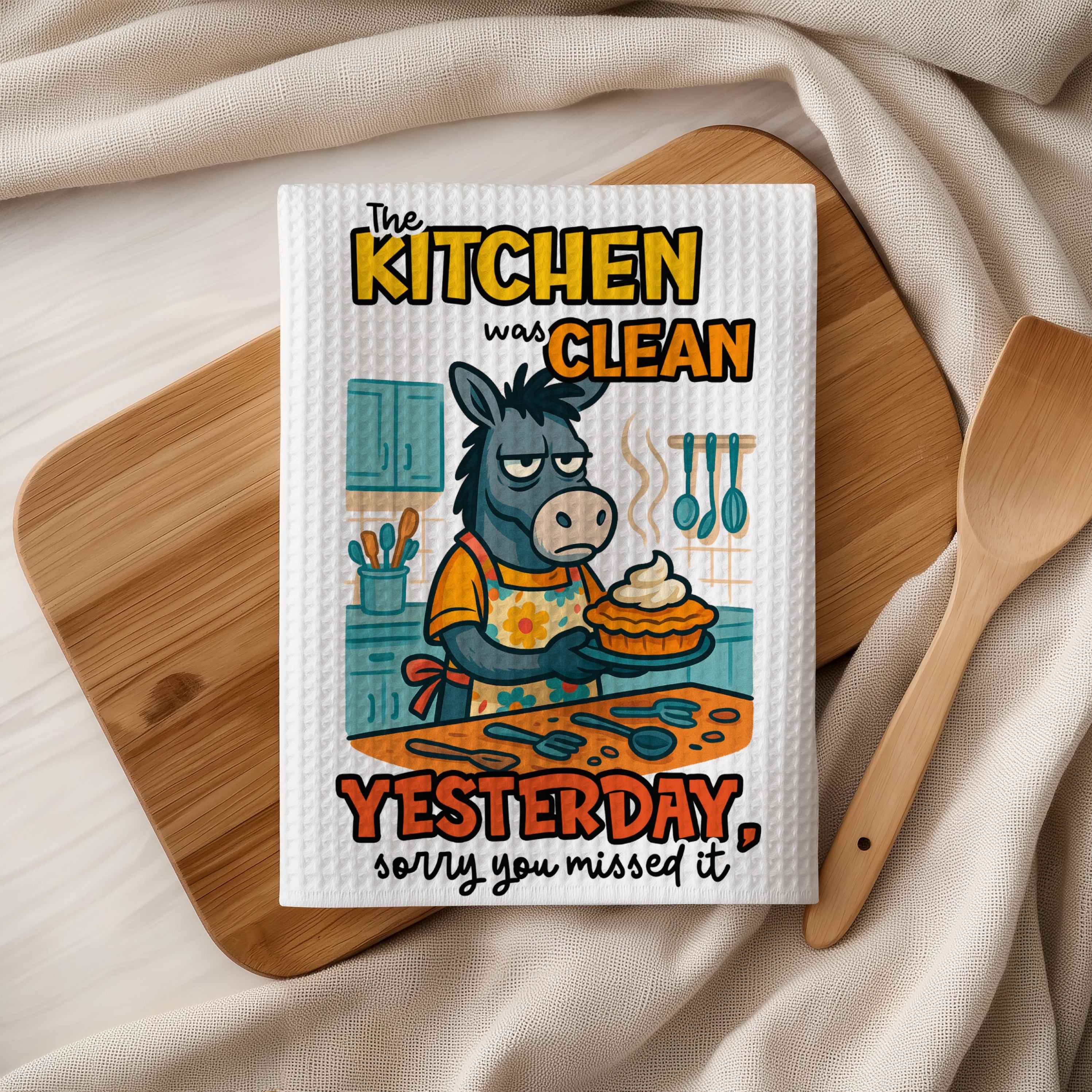 Grumpy donkey holding a pie with "The kitchen was clean yesterday, sorry you missed it" text.