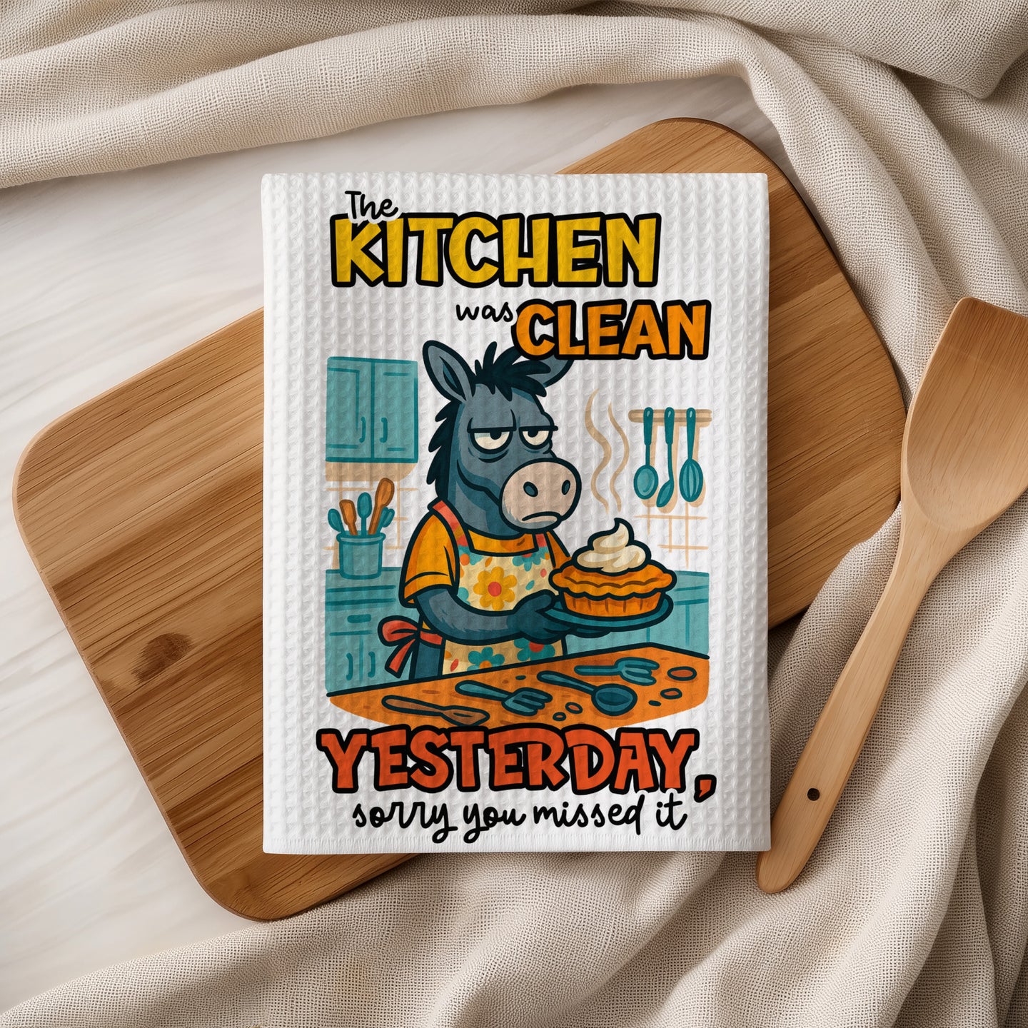 Grumpy donkey holding a pie with "The kitchen was clean yesterday, sorry you missed it" text.