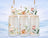 Three frosted glass jars with floral designs, set against a soft winter backdrop.