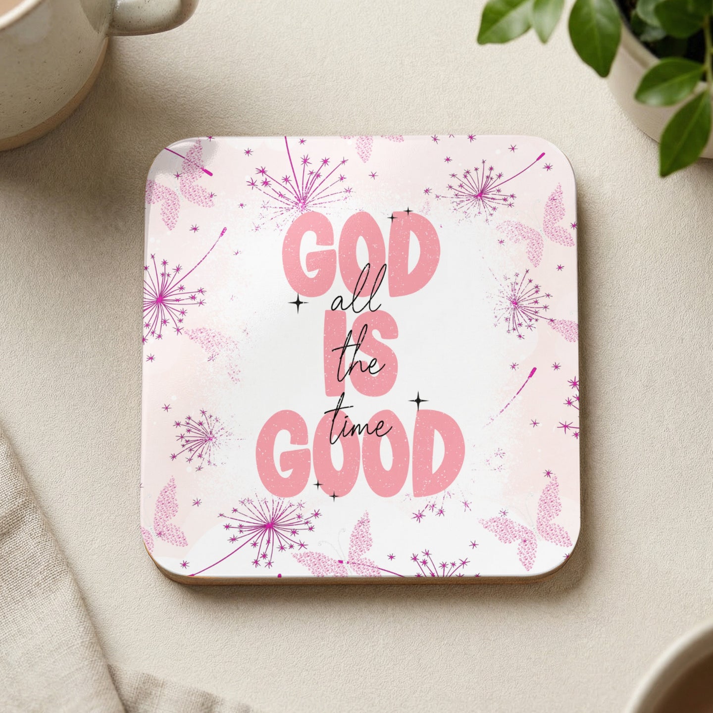 Coaster with "God is all the time good" text and pink floral design.