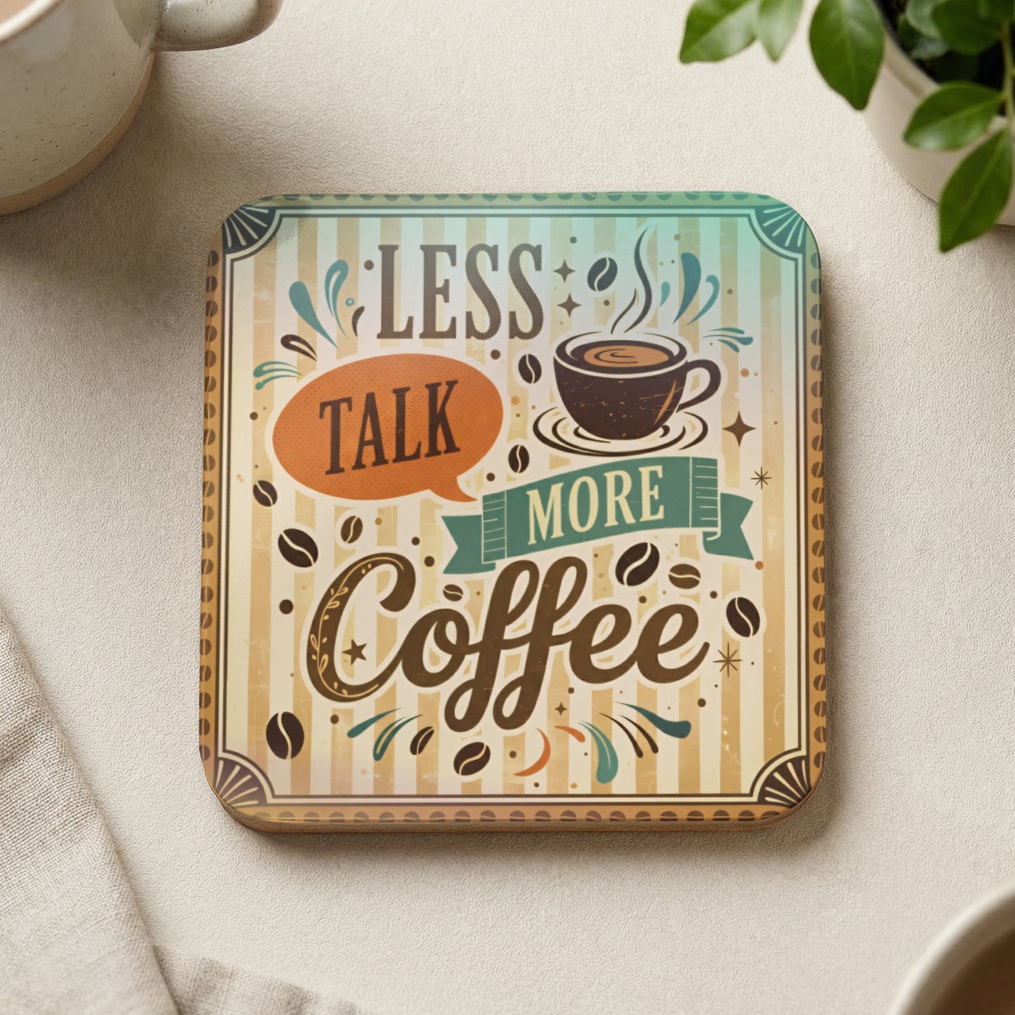 Coaster with "LESS TALK MORE COFFEE" text and coffee bean graphic.