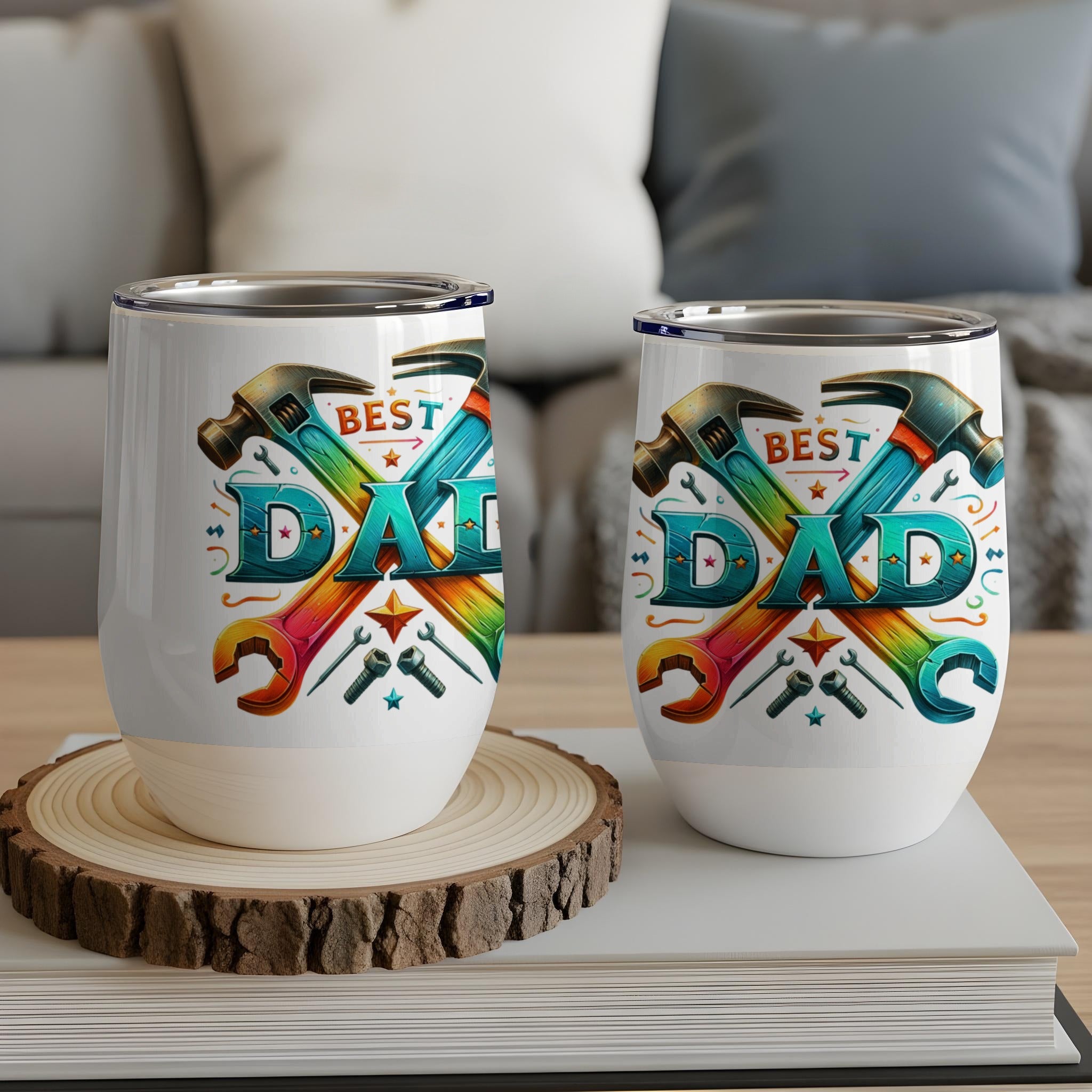 Two insulated tumblers with "BEST DAD" text surrounded by tools.