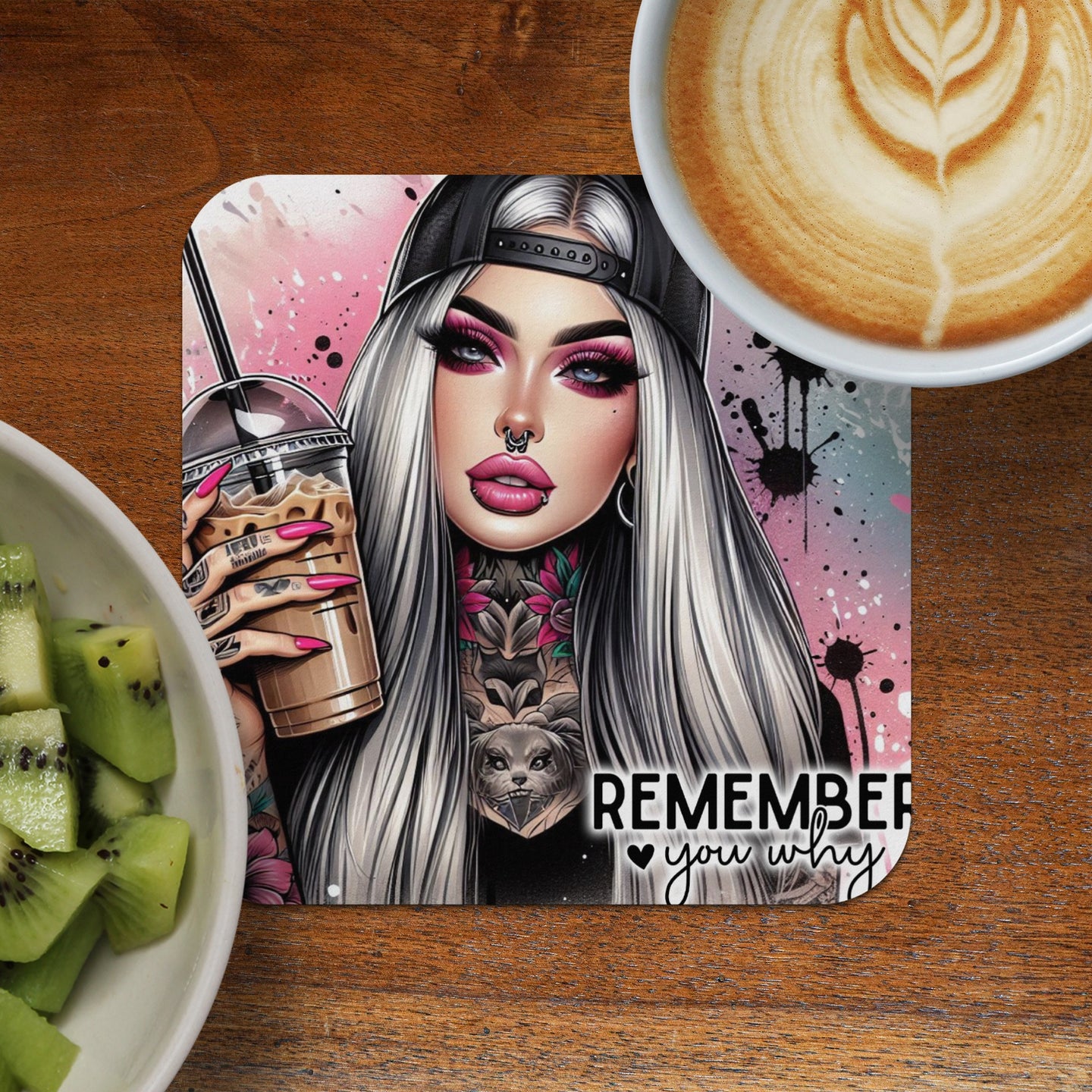 Woman with pink hair and tattoos holds iced coffee, with text "REMEMBER you why."