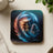 Coaster with feather, man in headdress, and moon. Text "Let the Earth be your guide."