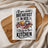 Waffle towel with "If you want breakfast in bed, sleep in the kitchen" text and toast.